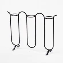 plant stand by Jean Royere, c. 1950, iron, sold Oct 2001