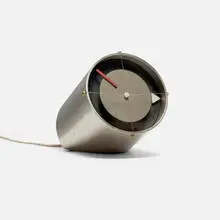 Clocknik table clock, model 2270B by George Nelson & Associates, 1959, stainless steel, brass, lacquered aluminum, steel wire, sold Mar 2025
