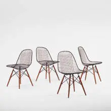 dowel leg chairs by Charles and Ray Eames, c.1950, wire, birch, sold Jun 2001