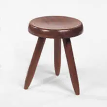 stool by Charlotte Perriand, walnut, sold Jun 2001