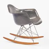 rocker by Charles and Ray Eames, 1949, fiberglass, zinc, birch, sold Jun 2001