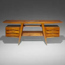 Executive desk by Gio Ponti, c. 1950s, Italian walnut, brass, glass, sold Mar 2025