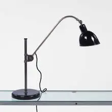 lamp by Christian Dell, 1930s, chrome-plated and enameled steel, sold Jun 2001