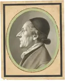 Johann Heinrich Lips, Portrait Johann Caspar Lavater, Um 1786, Tuschfeder und -pinsel in Schwarz, Grau und Braun, laviert und aquarelliert, mit Grün aquarelliertem, ovalem Rand, auf Bütten, aufgezogen auf Bütten