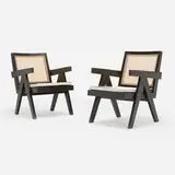 Easy armchairs from Chandigarh, pair by Pierre Jeanneret, c. 1955, rosewood, cane, sheepskin upholstery, sold Nov 2024