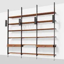 CSS (Comprehensive Storage System) by George Nelson & Associates, 1959, walnut, enameled and brushed aluminum, enameled steel, sold Nov 2024