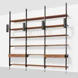 CSS (Comprehensive Storage System) by George Nelson & Associates, 1959, walnut, enameled and brushed aluminum, enameled steel, sold Nov 2024