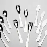 flatware, set of 20 by Gio Ponti, 1950s, stainless steel, sold Jun 2001