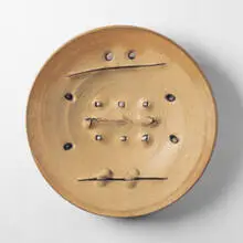 plate by Peter Voulkos, 1973, stoneware, porcelain, sold Jun 2001