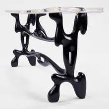 Paul Laszlo, console, 1953, ebonized wood, lucite
