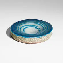Low bowl by Glen Lukens, c. 1940, crackle-glazed earthenware, sold Sep 2024