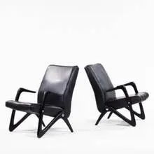 Alfred Hendrickx, lounge chairs, c. 1955, ebonized wood, leather