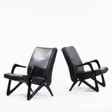 Alfred Hendrickx, lounge chairs, c. 1955, ebonized wood, leather