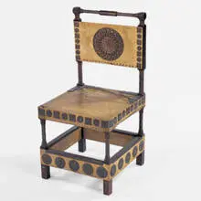 chair by Carlo Bugatti, c. 1895, walnut, parchment, copper, pewter, sold Jun 2001