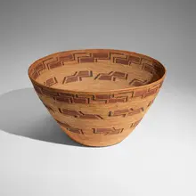 Maidu basket by Native American, c. 1910, sedge grass, redbud, bracken fern, willow, sold Sep 2024