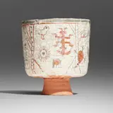 Footed bowl by Beatrice Wood, c. 1985, glazed earthenware with sgraffito decoration, sold Sep 2024