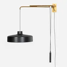 Gino Sarfatti, Articulating wall lamp, model 194-N, c. 1950, lacquered aluminum and steel, brass-plated metal