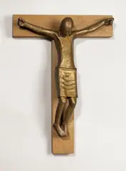 Kruzifix I by Gerhard Marcks, 1948, Bronze mit goldbrauner Patina, auf Holzkreuz montiert. Höhe: 58 cm (Kreuz 67,5 cm) (22 ⅞ in. (Kreuz 26 ⅝ in.)), sold Jun 2012