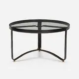 Jacques Adnet, Coffee table, c. 1955, saddle-stitched leather over steel, glass, brass