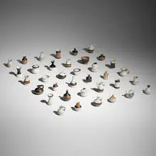 Bruno Gambone, Collection of thirty-six Mignon vases, c. 1985, glazed stoneware in artist-made shadowbox frame