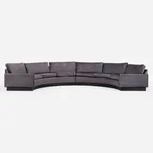 Sectional sofa by Milo Baughman, upholstery, faux leather over wood, sold Jul 2024