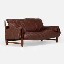 Soft sofa by Sergio Rodrigues, 1957, jacaranda, leather, canvas webbing, sold Jul 2024