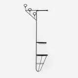 Jacques Adnet, Wall rack, c. 1955, saddle-stitched leather over enameled iron