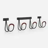 Jacques Adnet, Wall hooks, set of three, c. 1955, saddle-stitched leather over steel