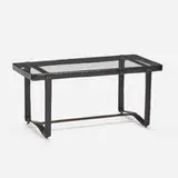 Jacques Adnet, Coffee table, c. 1955, saddle-stitched leather over steel, glass