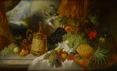 Jan van Huysum, A still life with an array of fruit, flowers, a jeweled tankard and a silver plateau on a draped marble ledge, oil on canvas laid down on masonite