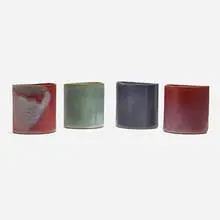 Planters, set of four by David Cressey, c. 1970, glazed earthenware, sold Apr 2024