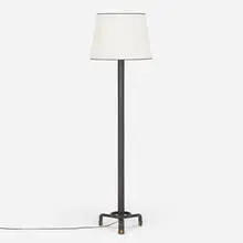 Jacques Adnet, Floor lamp, c. 1950, saddle-stitched leather over steel, brass