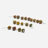 Collection of eighteen beads by Doyle Lane, c. 1965, glazed stoneware, glazed terracotta, sold Feb 2024
