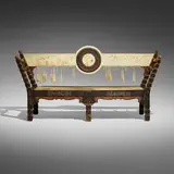 Carlo Bugatti, Important bench, c. 1900, carved and ebonized wood, Italian walnut, pewter inlay, hand-decorated vellum, copper, brass, silk