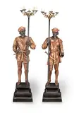 Anatole Jean Thomas Guillot, pair of decorative patinated and gilt bronze figural five light torchieres, gilt bronze
