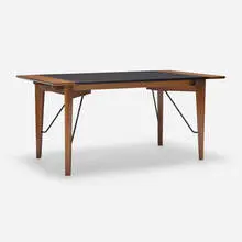 Dining table by Greta Magnusson Grossman, 1952, walnut, laminate, enameled steel, sold Nov 2023