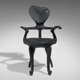 Maarten Baas, Calvet armchair from the Where There's Smoke series, 2004, charred oak, epoxy resin
