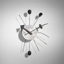 Maarten Baas, Ball wall clock from the Where There's Smoke series, 2004, charred and lacquered beech, steel, aluminum