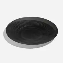 Bowl by Esther and Gross Wood, 1952, perforated and enameled steel, sold Nov 2023
