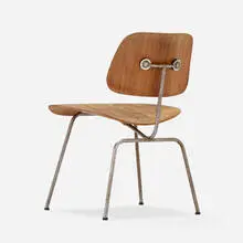 Charles and Ray Eames, DCM, molded walnut plywood, chrome-plated steel, rubber, plastic