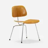 DCM by Charles and Ray Eames, aniline-dyed birch plywood, chrome-plated steel, rubber, sold Nov 2023