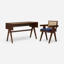 Desk and chair from Chandigarh by Pierre Jeanneret, c. 1960, teak, linen upholstery, cane, sold Aug 2026