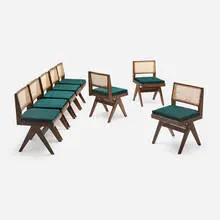 Dining chairs from Punjab University Student Residence, Chandigarh, set of eight by Pierre Jeanneret, c. 1958-59, teak, cane, upholstery, sold Aug 2026