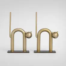 Walter von Nessen, Cat bookends model 17042, pair, c. 1930, nickel plated brass
