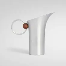 Russel Wright, Pitcher, c. 1932, walnut, spun aluminum