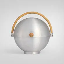 Russel Wright, Bun warmer, c. 1932, spun aluminum, walnut