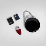 Art Déco, Collection of four accessories, c. 1925-1935, plastic, silver-plated brass, chrome-plated steel, enameled metal