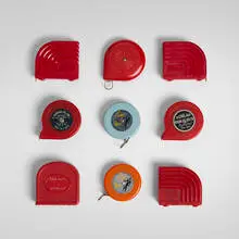 Vintage, Collection of nine tape measures, c. 1930-1950, plastic, brass, zinc-plated steel