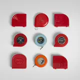 Vintage, Collection of nine tape measures, c. 1930-1950, plastic, brass, zinc-plated steel