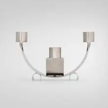Walter von Nessen, Candelabrum, c. 1940, nickel-plated brass